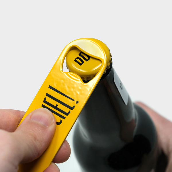 Yellow metal bottle opener